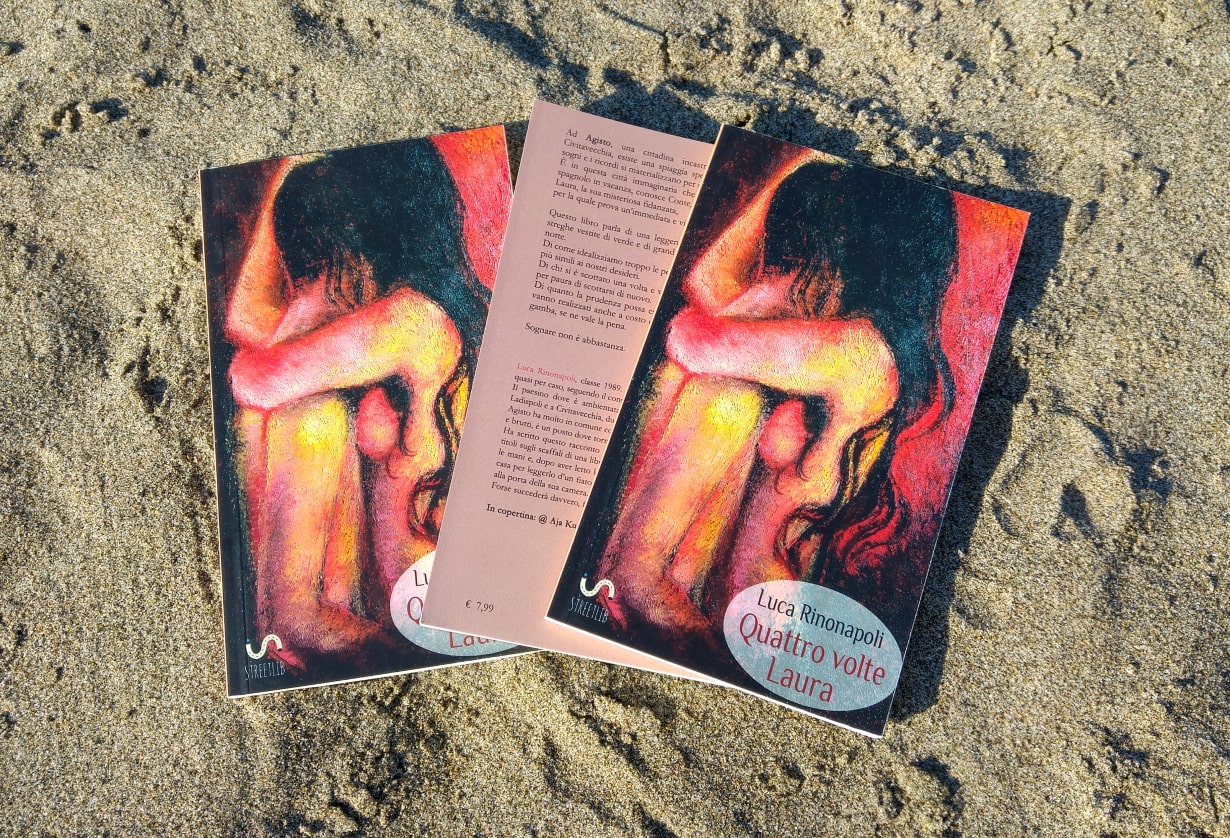 three copies of quattro volte laura book on the sand promotional